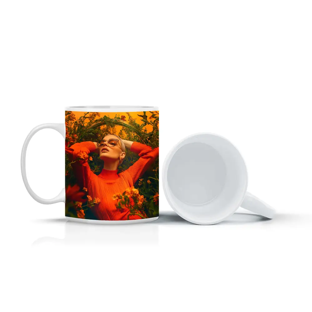 Woman in Orange Dress Among Wildflowers – Mugs