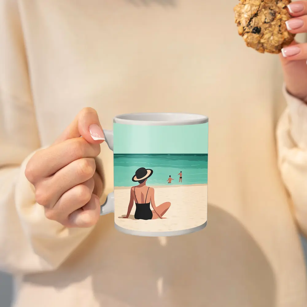 Woman In Hat Sitting On Beach – Mugs