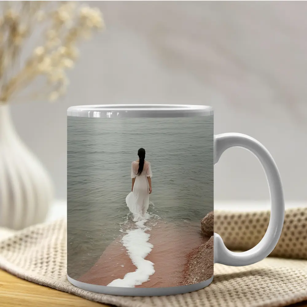 Woman White Dress Walking Into Calm Sea – Mugs