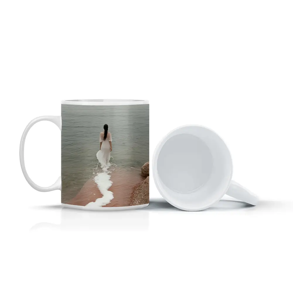 Woman White Dress Walking Into Calm Sea – Mugs