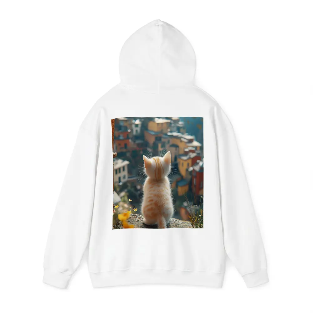 Orange Kitten Overlooking Colorful Hillside Village – Hoodies