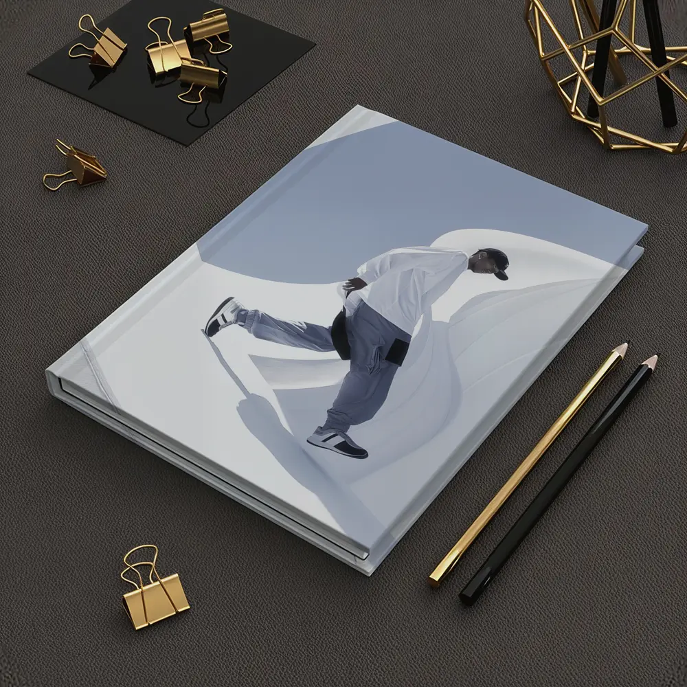 Man Running Through White Architectural Curves – Notebooks