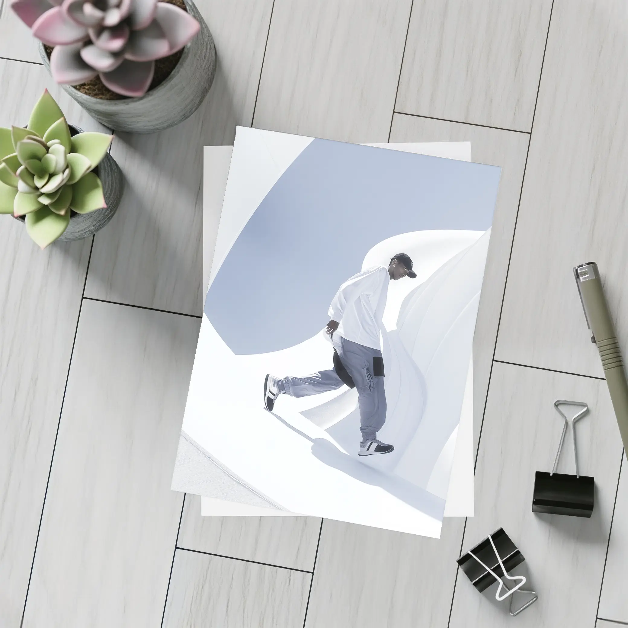 Man Running Through White Architectural Curves – Postcards