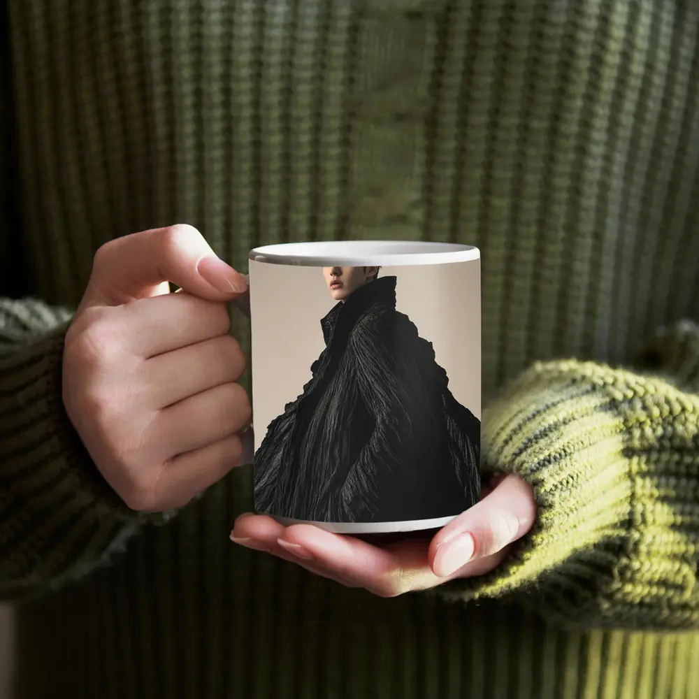 Young Asian Man Dramatic Black Cloak Portrait – Mugs