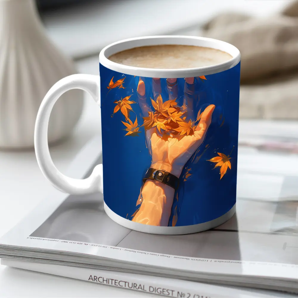 Hand Holding Autumn Leaves Over Blue Water – Mugs