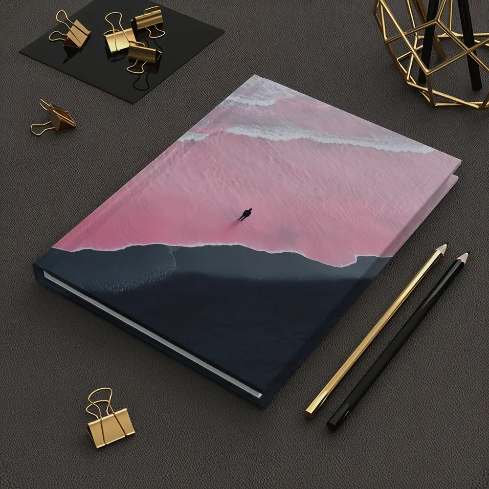 Lone Figure Pink Ocean Black Sand Beach – Notebooks