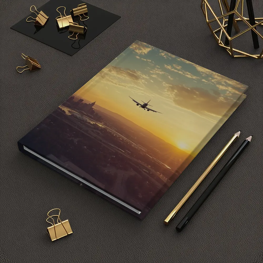 Airplane Silhouette Flying Over City Sunset – Notebooks