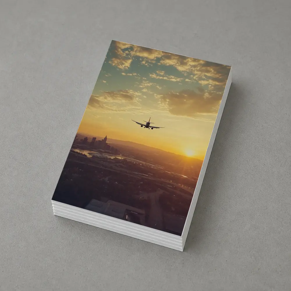 Airplane Silhouette Flying Over City Sunset – Postcards