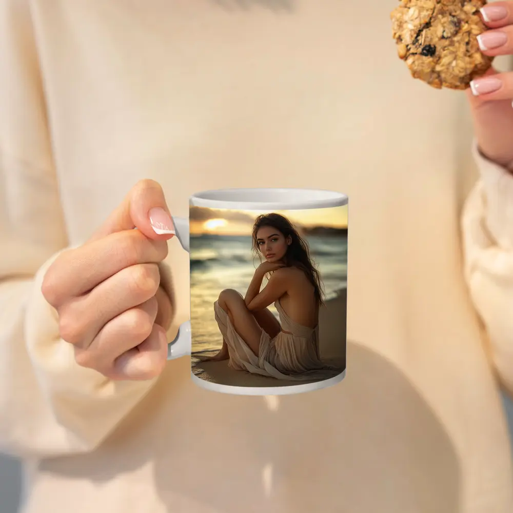 Woman in Beige Dress Sitting Beach Sunset – Mugs