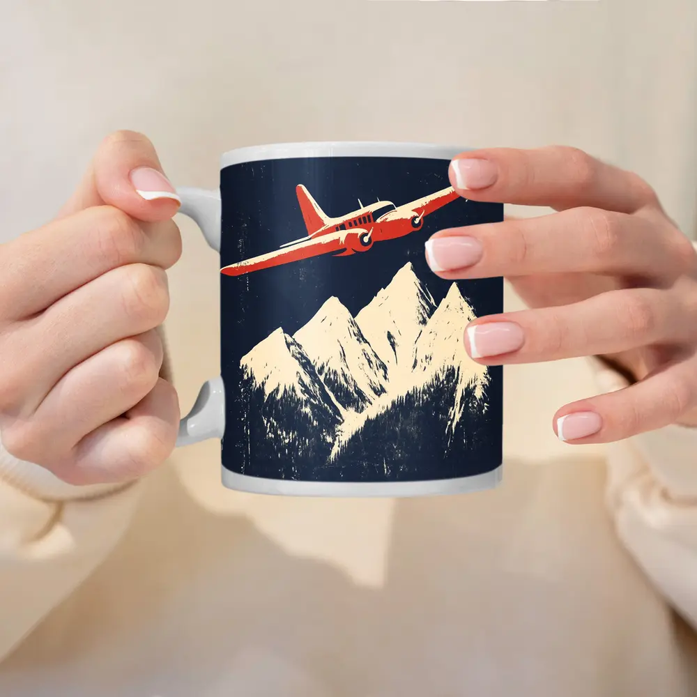 Red Vintage Plane Flying Over Snowy Mountains – Mugs