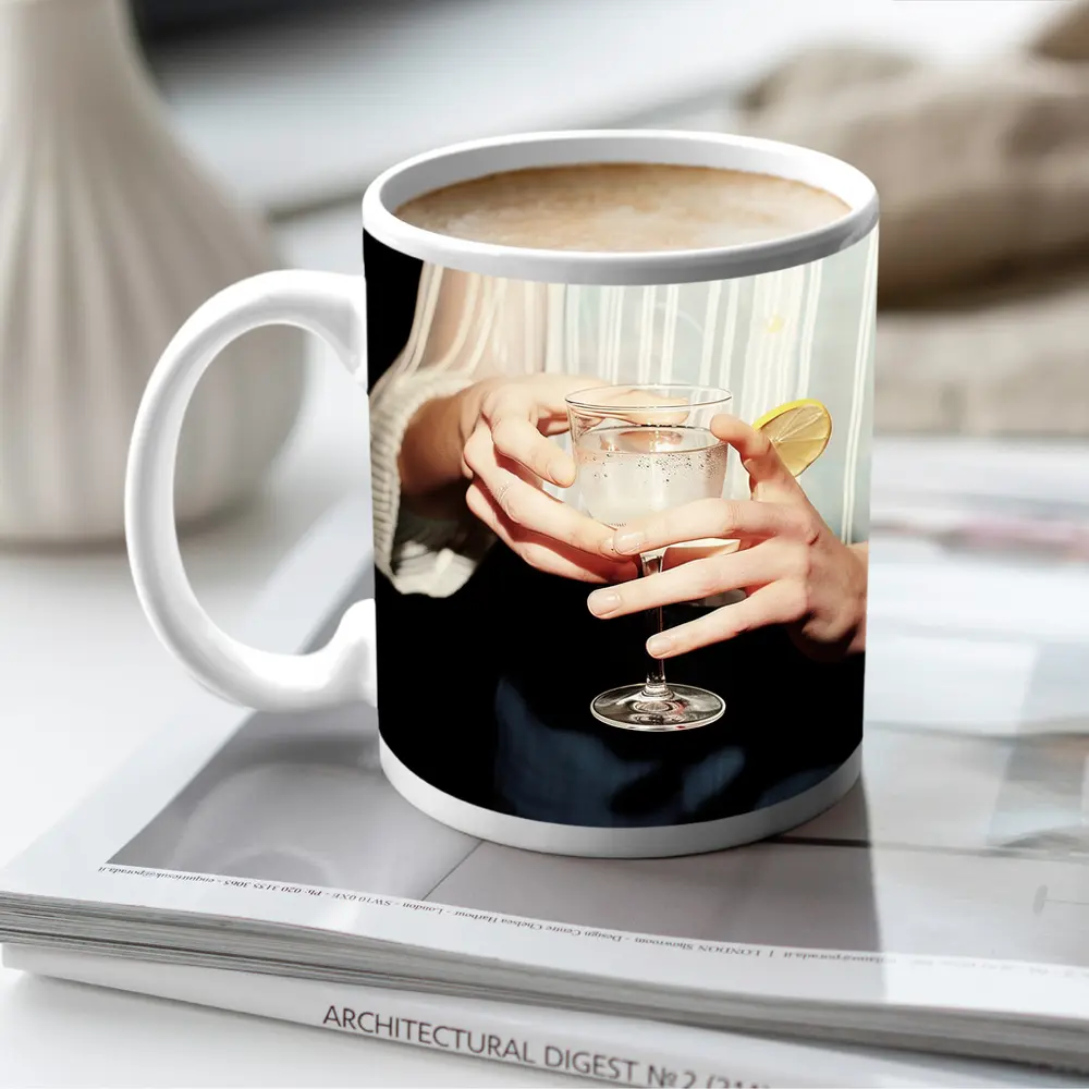 Hands Holding Cocktail Glass With Lemon – Mugs