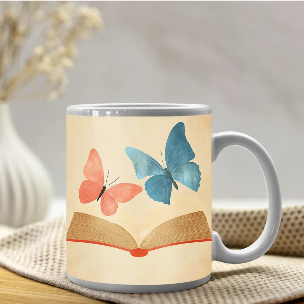Two Butterflies Flying From Open Book – Mugs