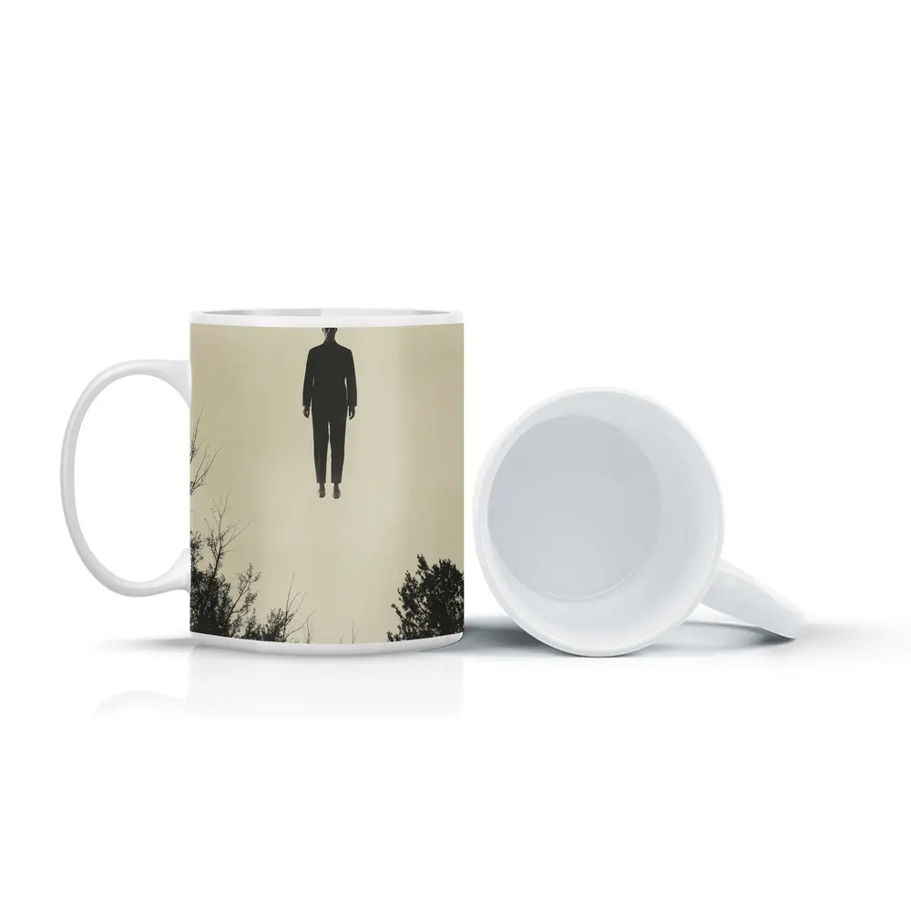 Floating Man Silhouette Above Dark Trees – Mugs