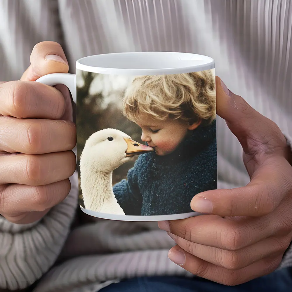 Child Kissing White Goose Outdoors – Mugs