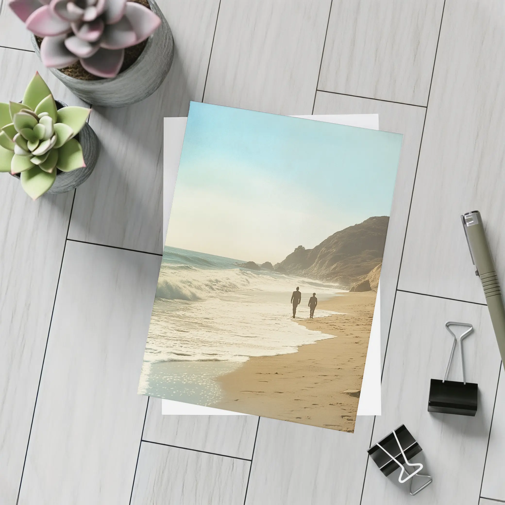 Two People Walking Along Sunny Beach Shore – Postcards