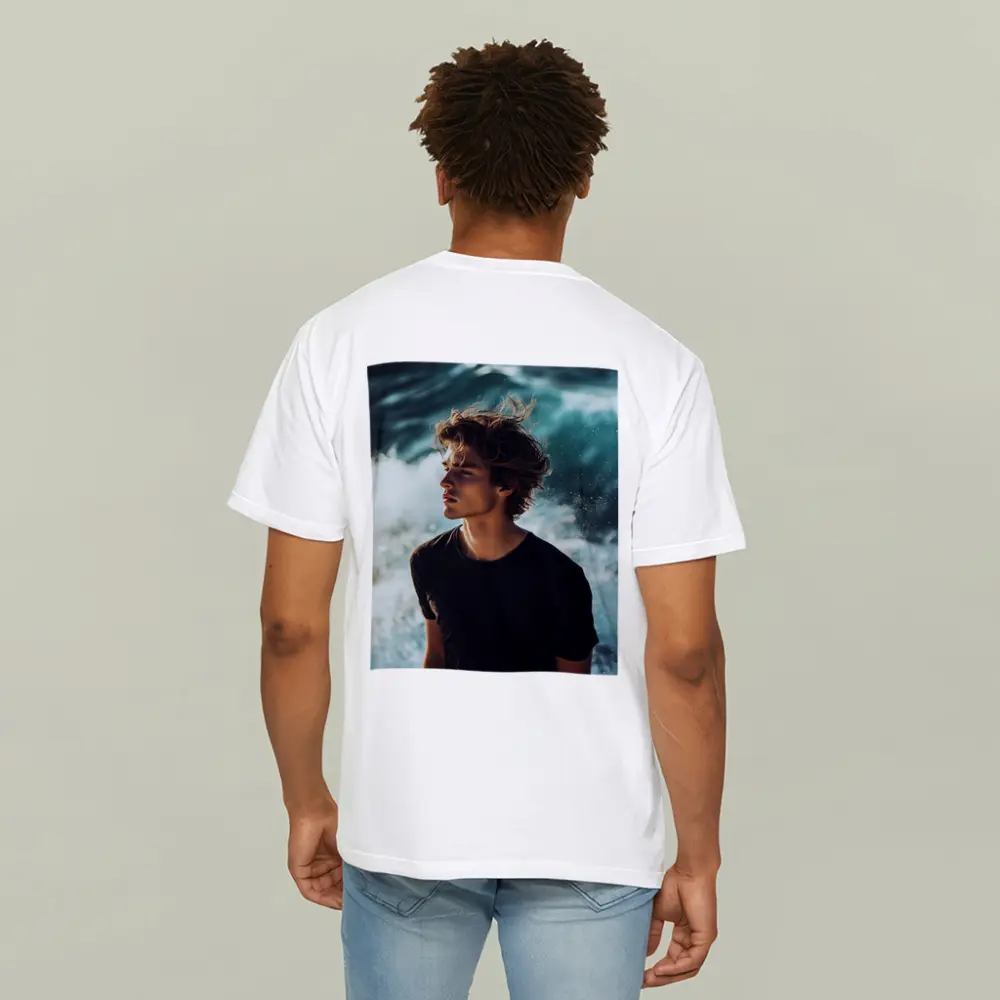 Young Man Standing By Ocean Waves – T-Shirts