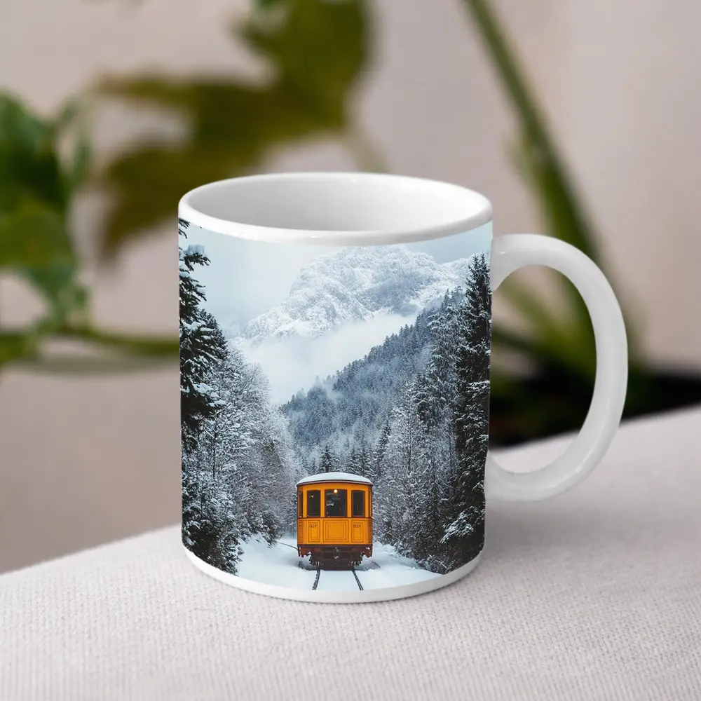 Yellow Train Passing Through Snowy Mountain Forest – Mugs