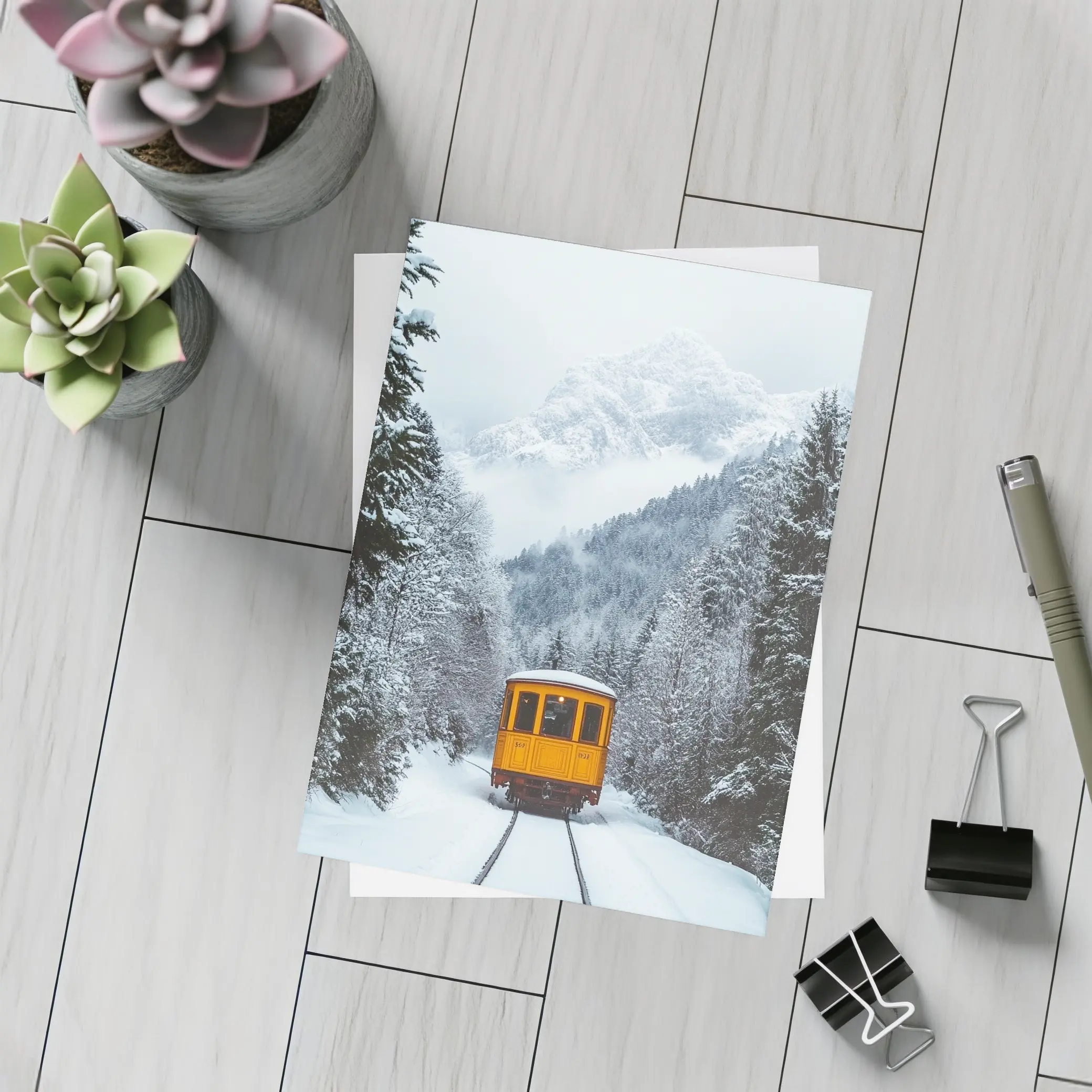 Yellow Train Passing Through Snowy Mountain Forest – Postcards