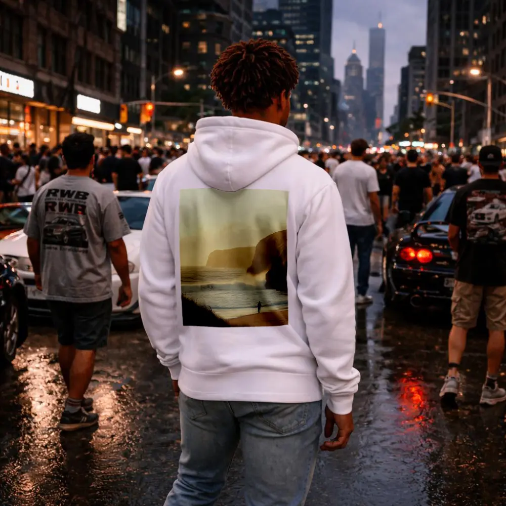 Lone Figure Standing on Golden Coastal Beach – Hoodies