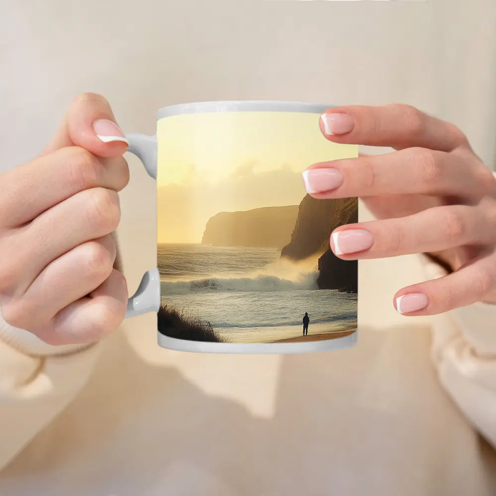 Lone Figure Standing on Golden Coastal Beach – Mugs