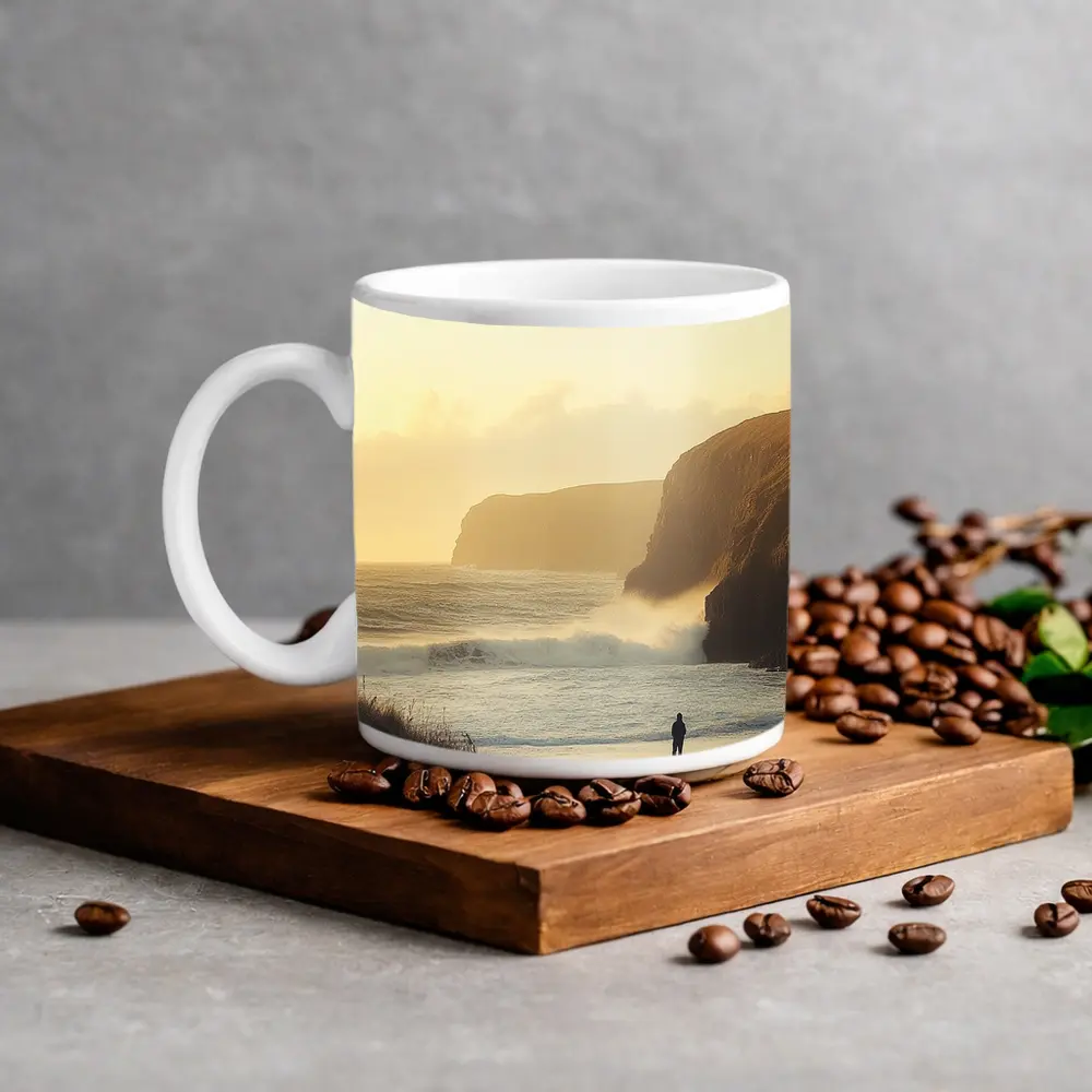 Lone Figure Standing on Golden Coastal Beach – Mugs