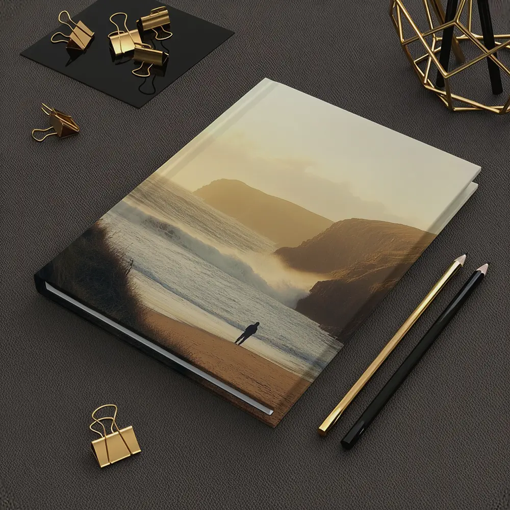 Lone Figure Standing on Golden Coastal Beach – Notebooks