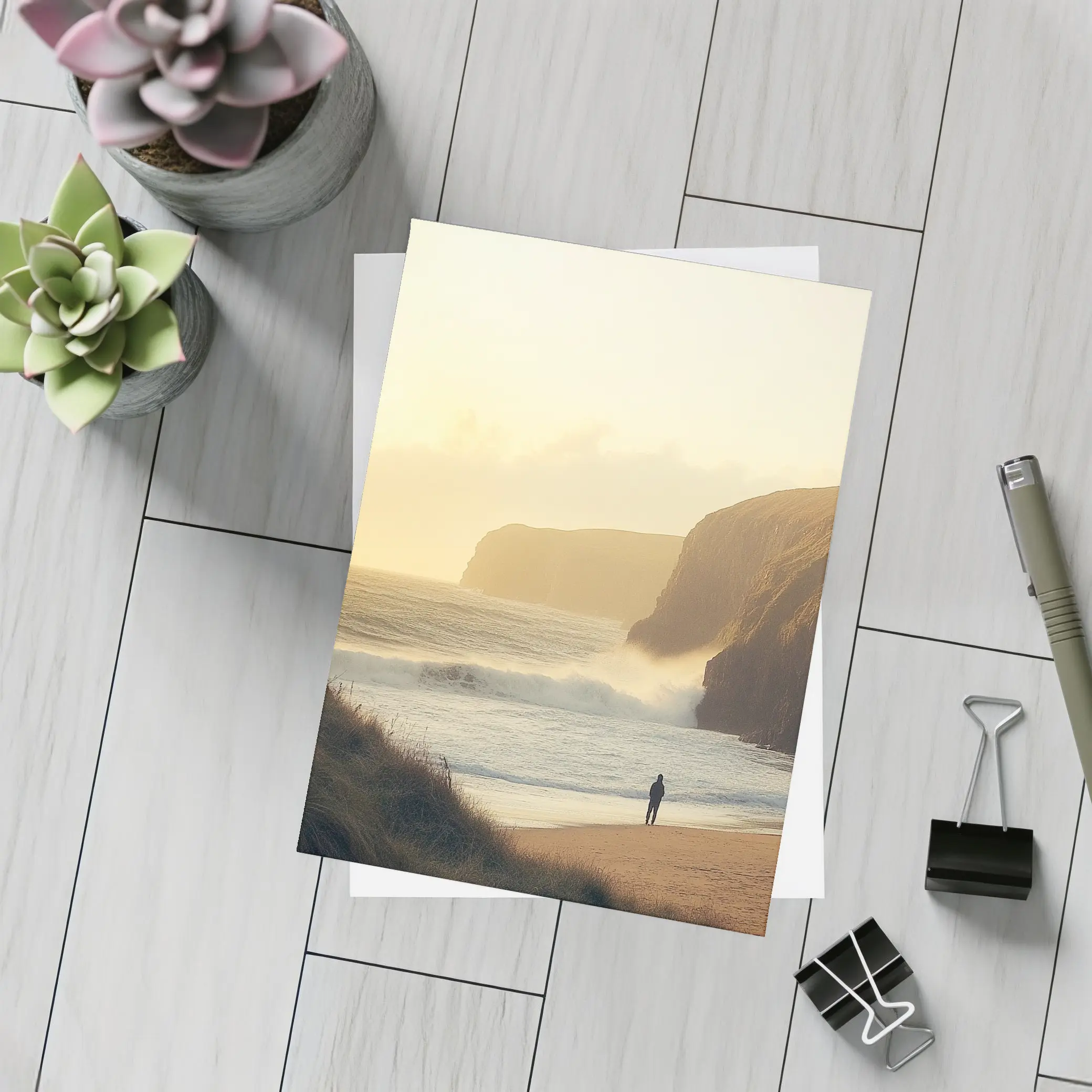 Lone Figure Standing on Golden Coastal Beach – Postcards