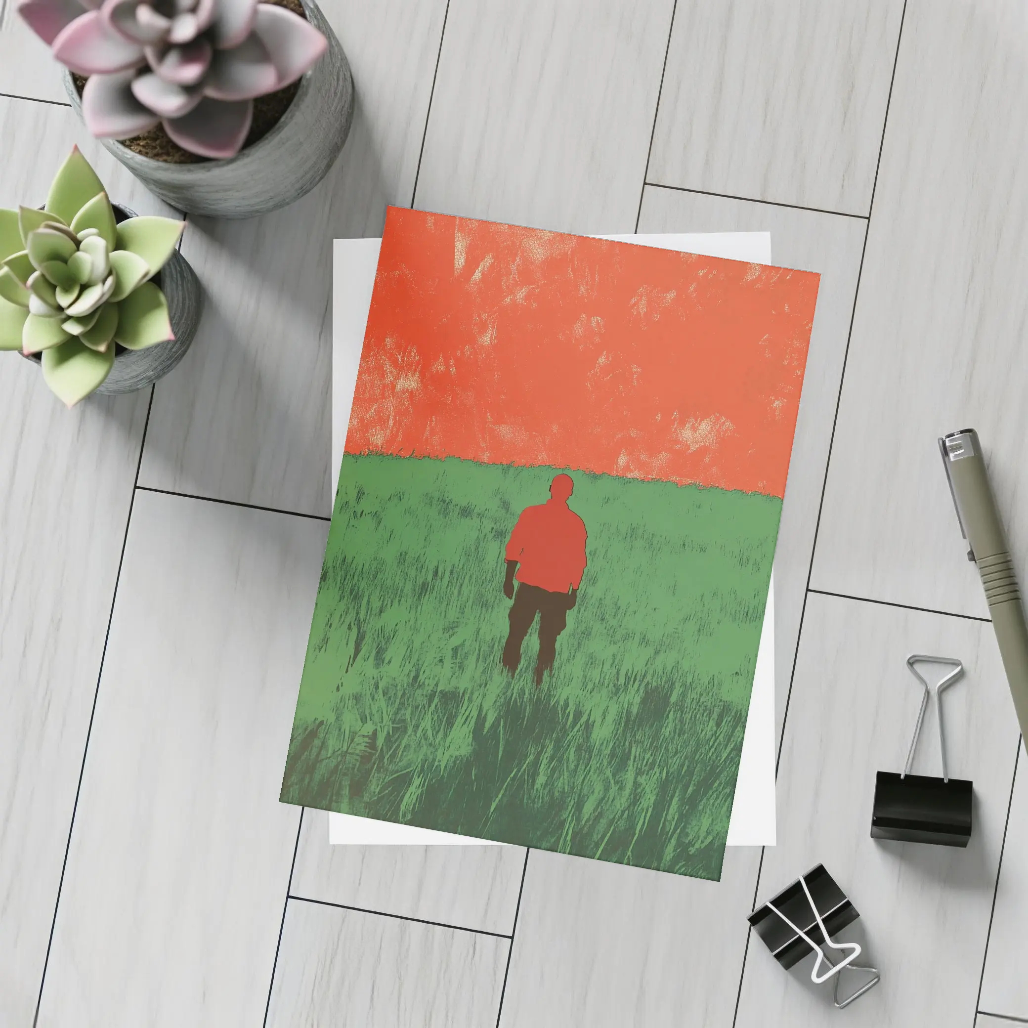 Lone Figure Standing in Green Field – Postcards