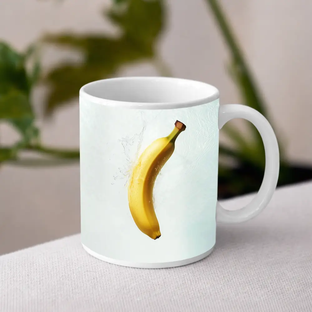 Banana Splashing Through Clear Water Background – Mugs