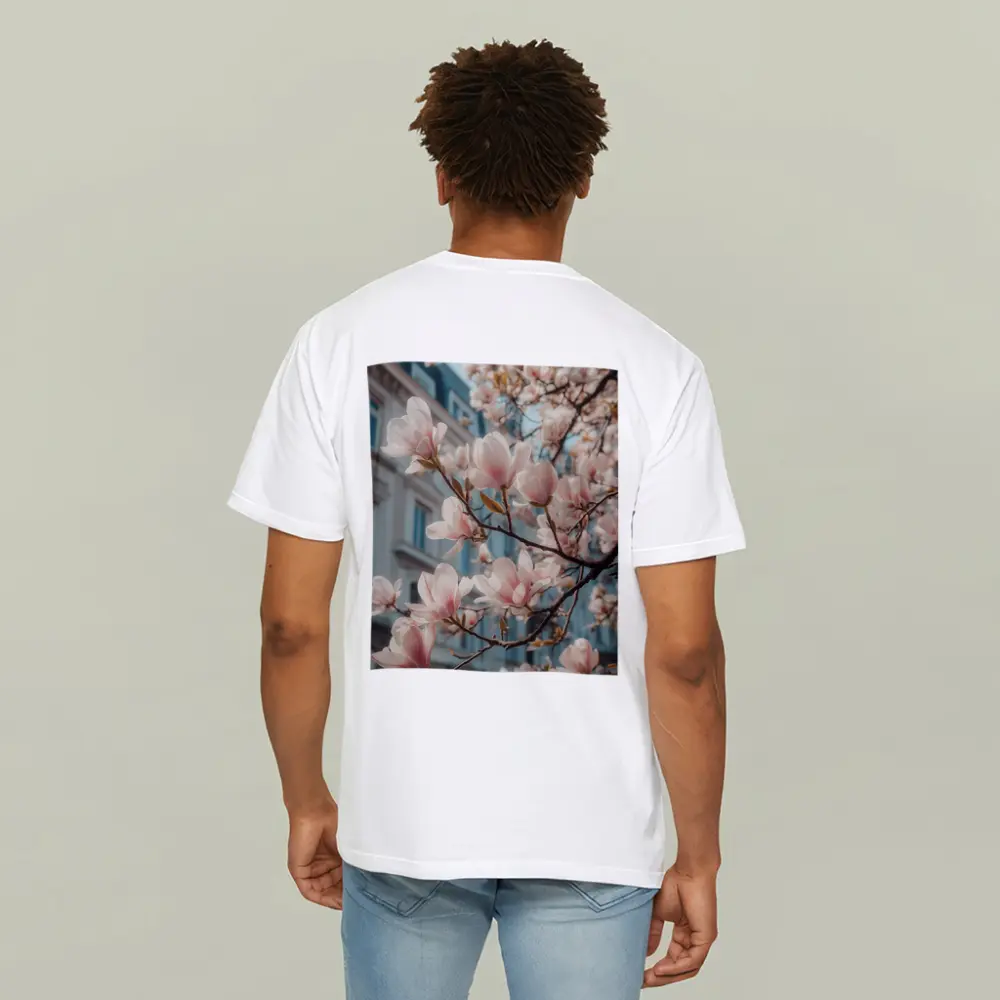 Pink Magnolia Blossoms Against City Buildings – T-Shirts