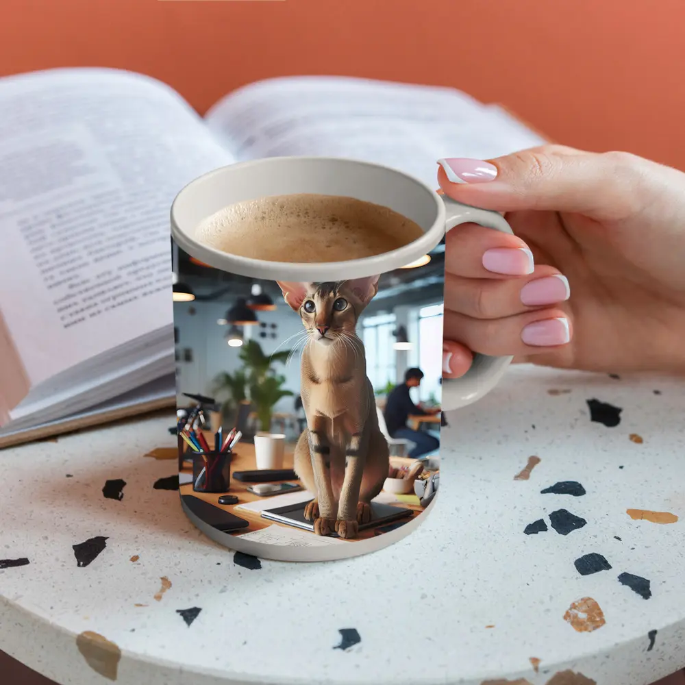 Abyssinian Cat Sitting on Office Desk – Mugs