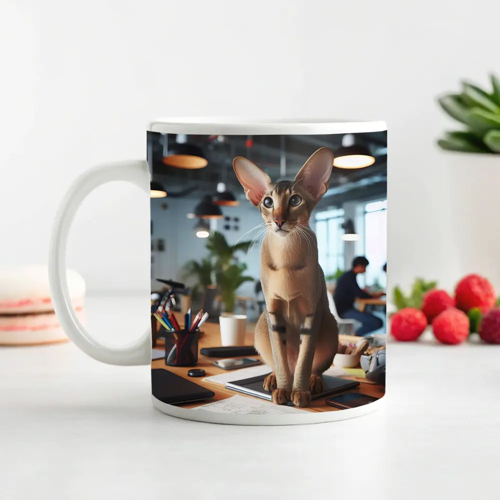 Abyssinian Cat Sitting on Office Desk – Mugs