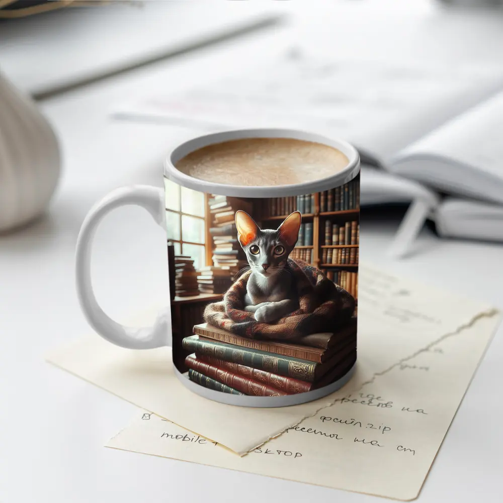 Oriental Shorthair Cat Resting On Books – Mugs