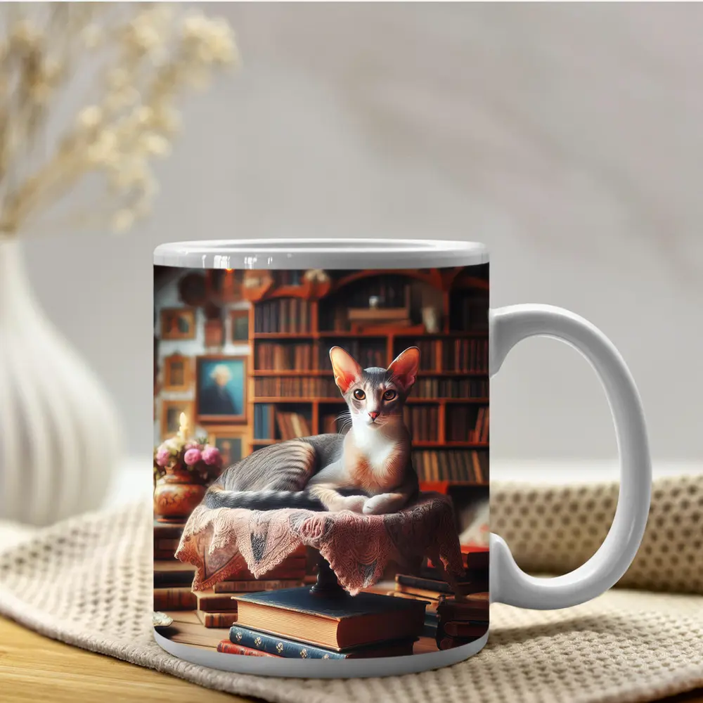 Abyssinian Cat Resting in Cozy Library – Mugs