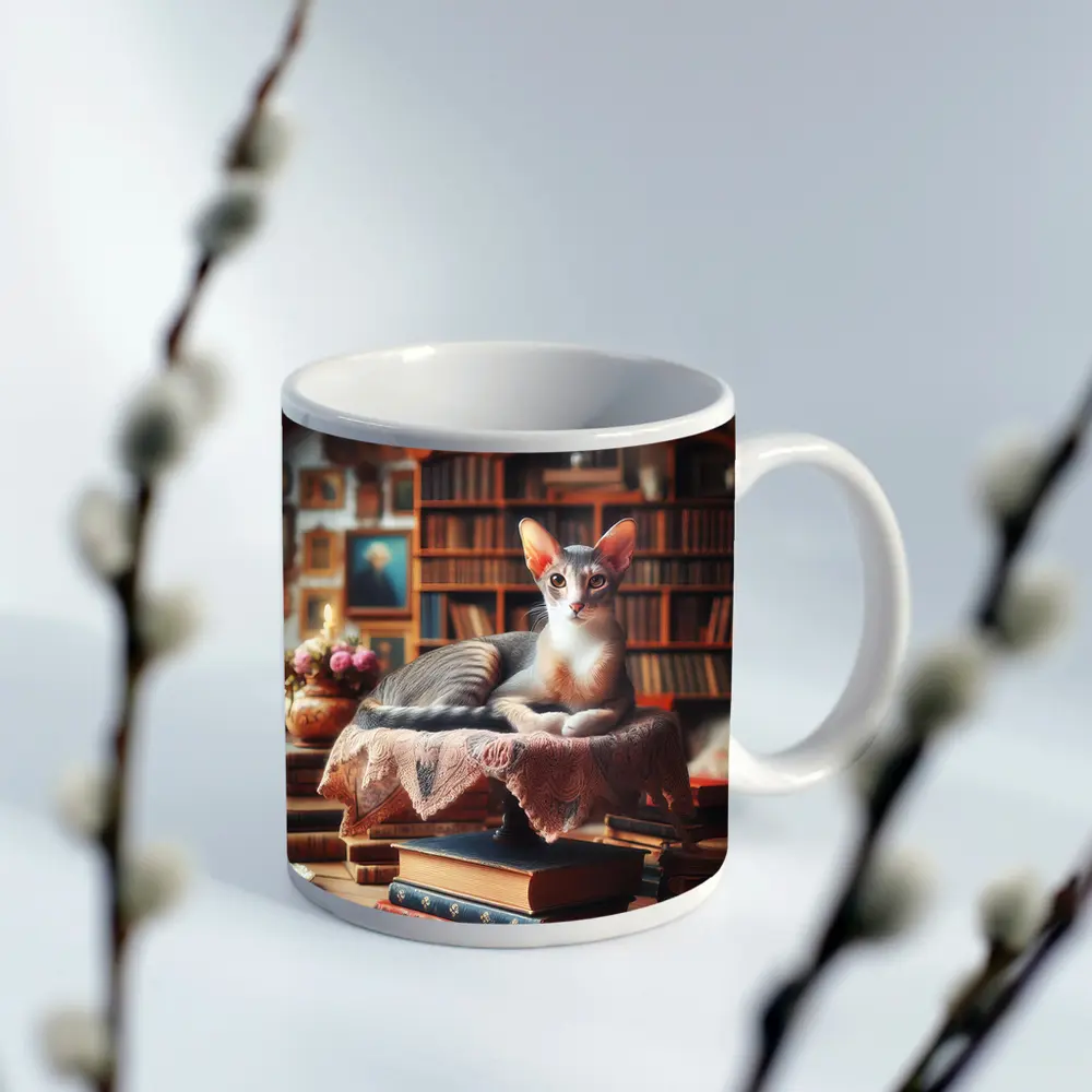 Abyssinian Cat Resting in Cozy Library – Mugs