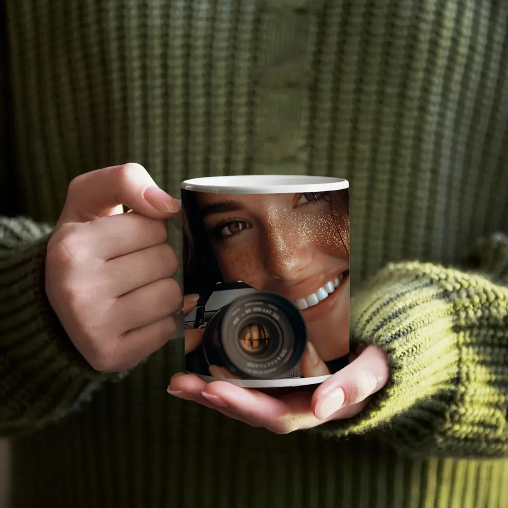 Smiling Woman Holding Camera Close Up – Mugs
