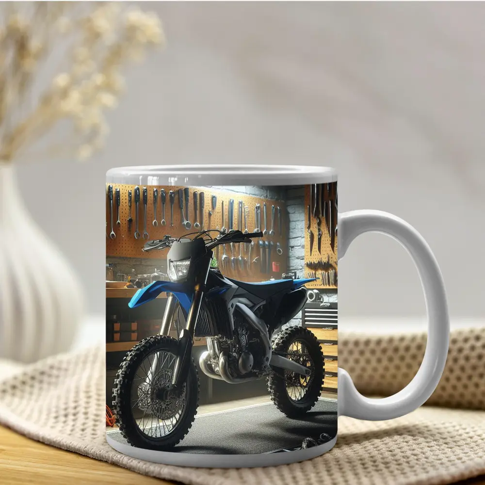 Blue Dirt Bike Parked Inside Mechanic Garage – Mugs