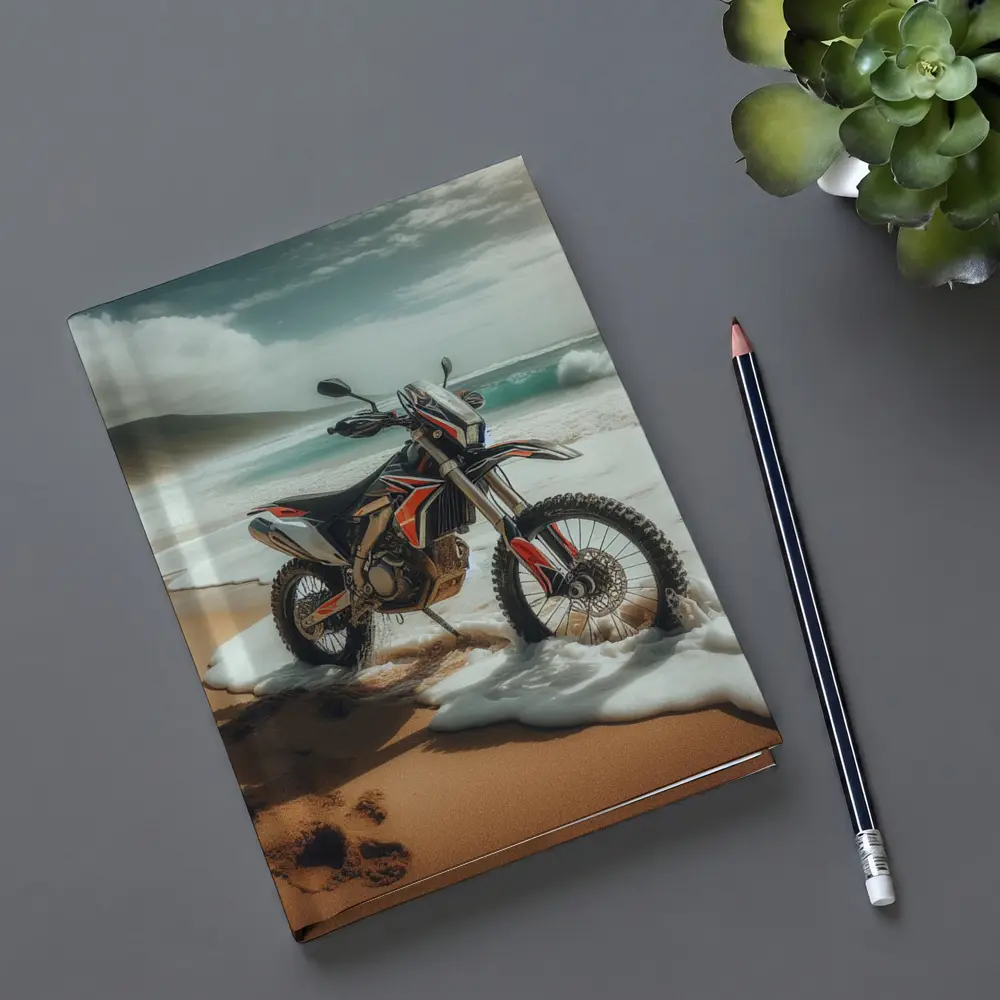Dirt Bike Parked on Sandy Ocean Beach – Notebooks