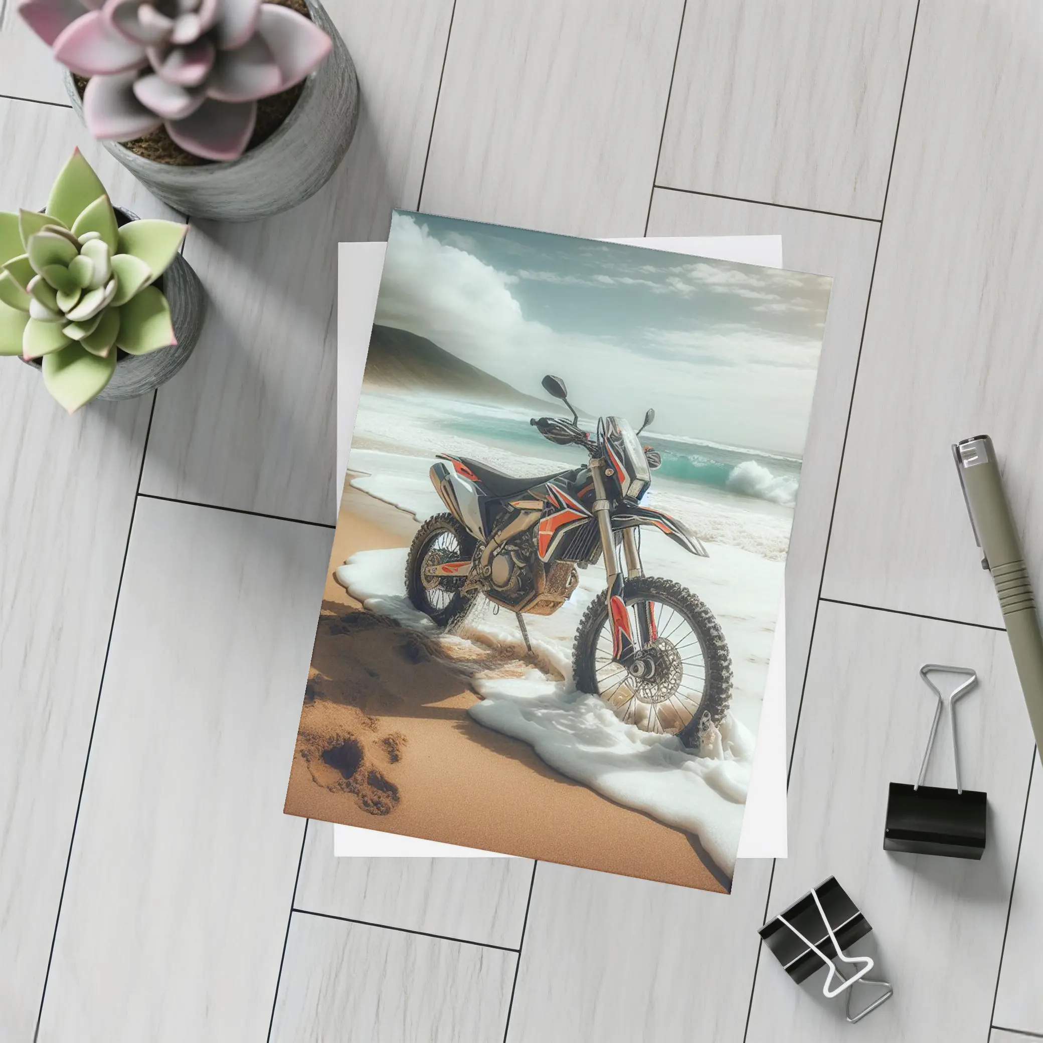 Dirt Bike Parked on Sandy Ocean Beach – Postcards