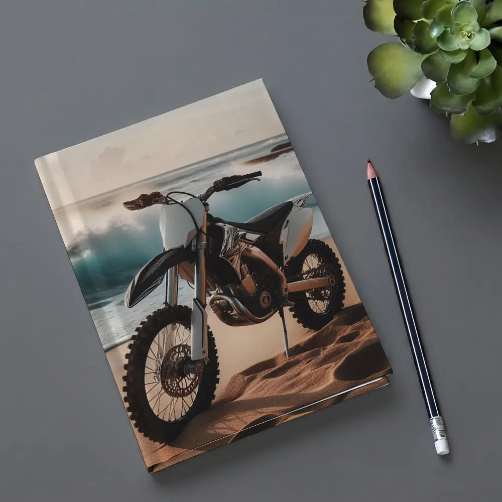 Dirt Bike Parked on Sandy Beach Shore – Notebooks