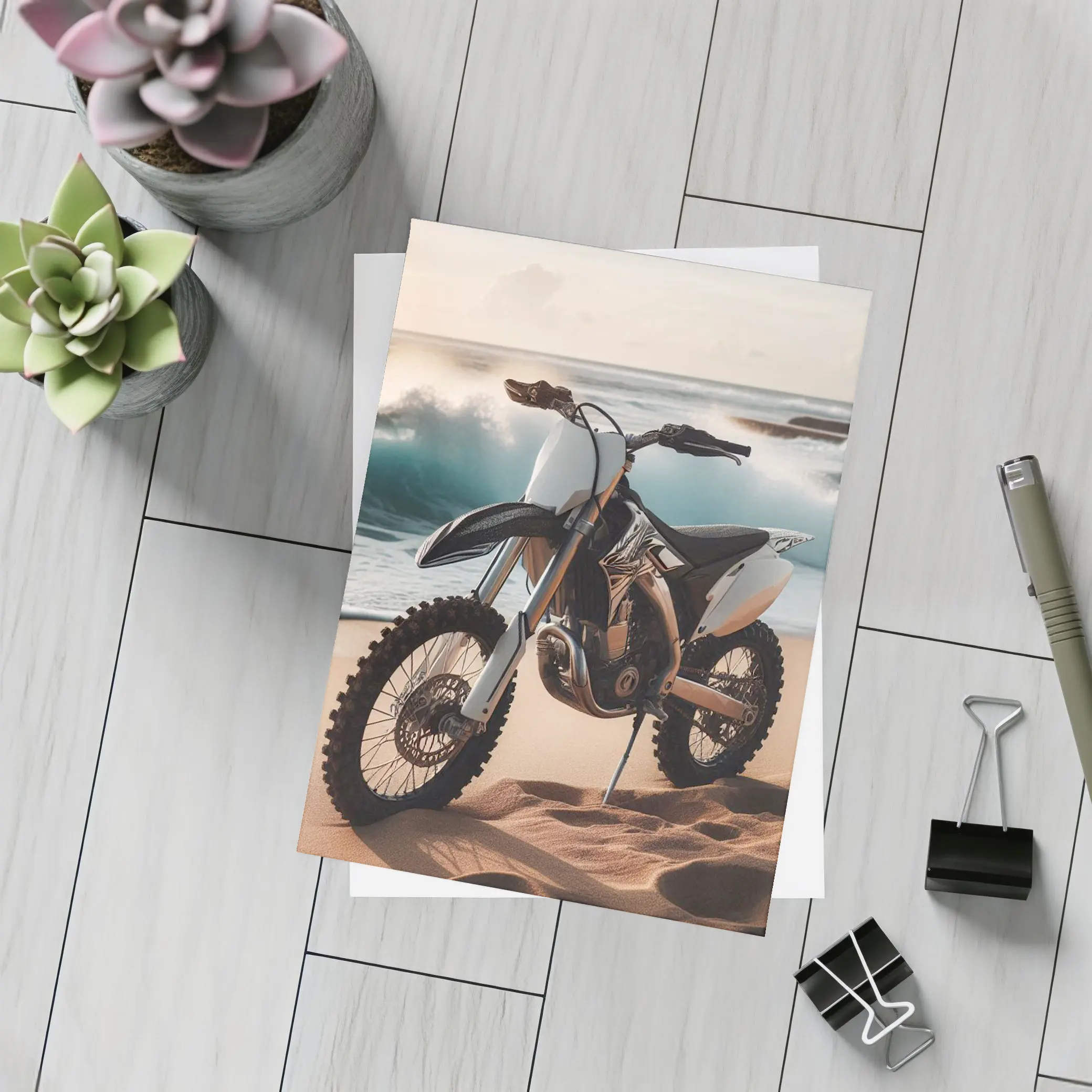 Dirt Bike Parked on Sandy Beach Shore – Postcards