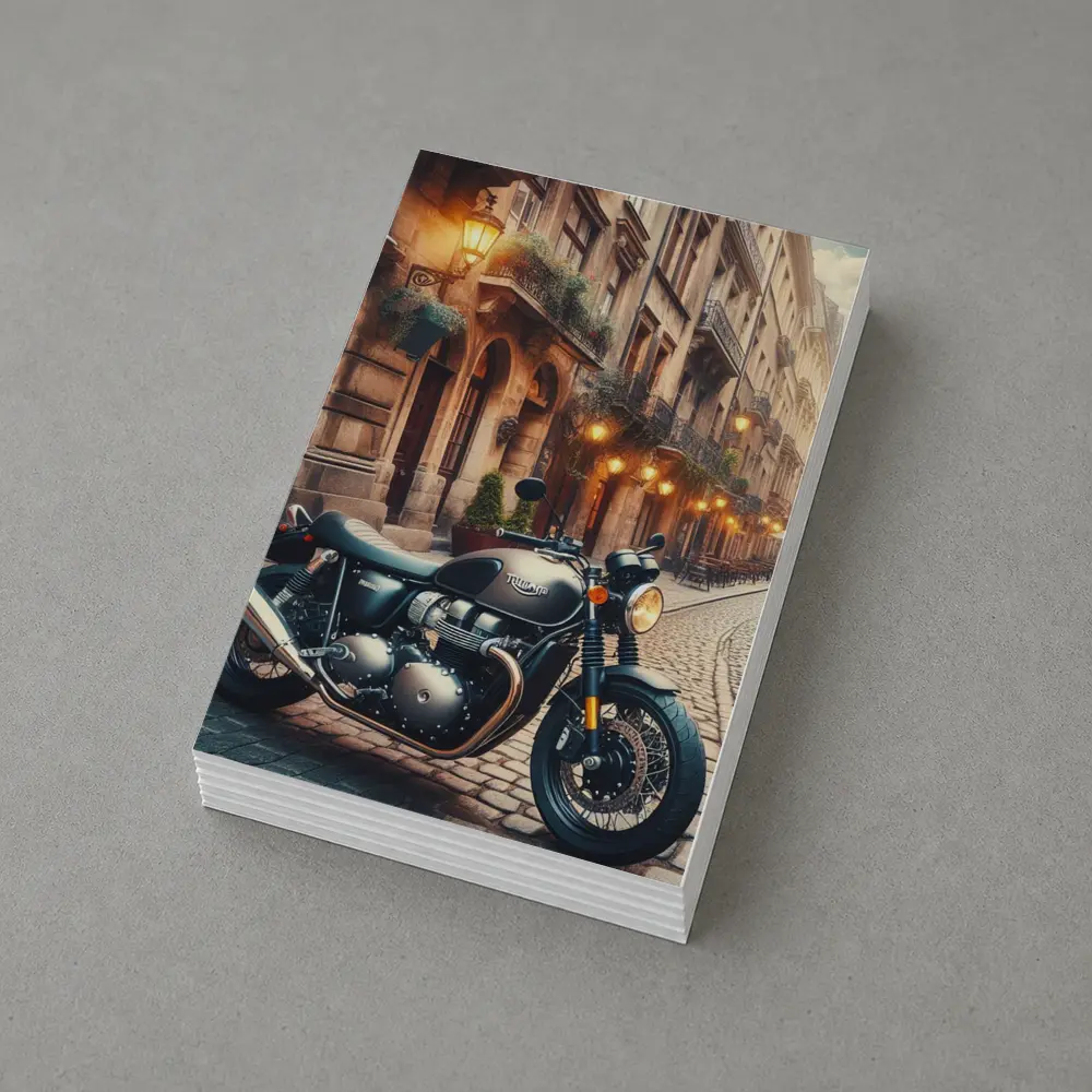 Triumph Motorcycle Parked on Cobblestone Street – Postcards