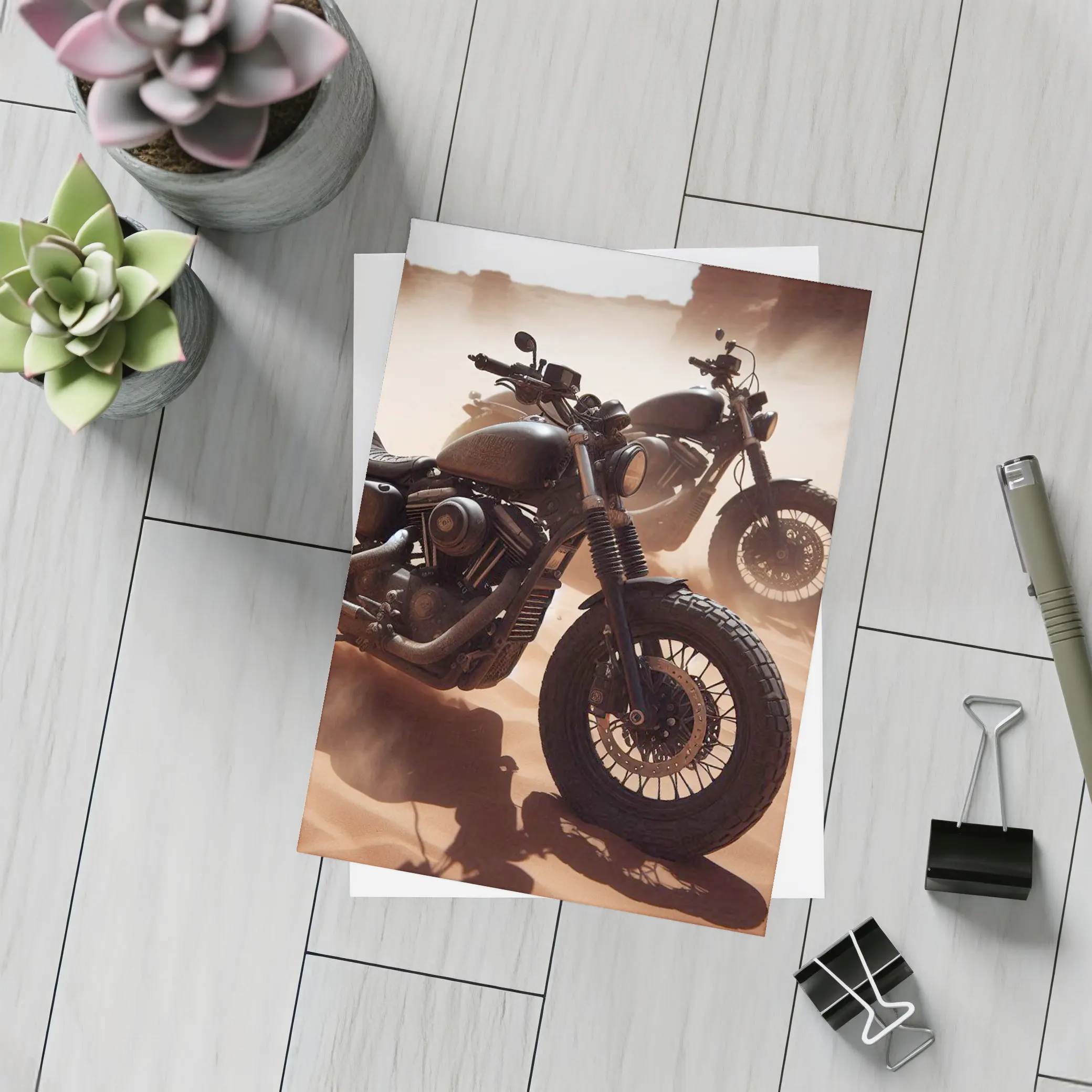 Dark Motorcycles Parked On Desert Sand – Postcards