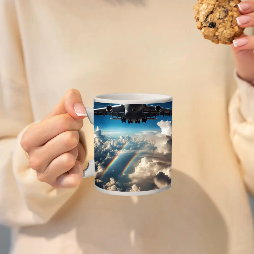 Large Airplane Flying Above Rainbow Clouds – Mugs