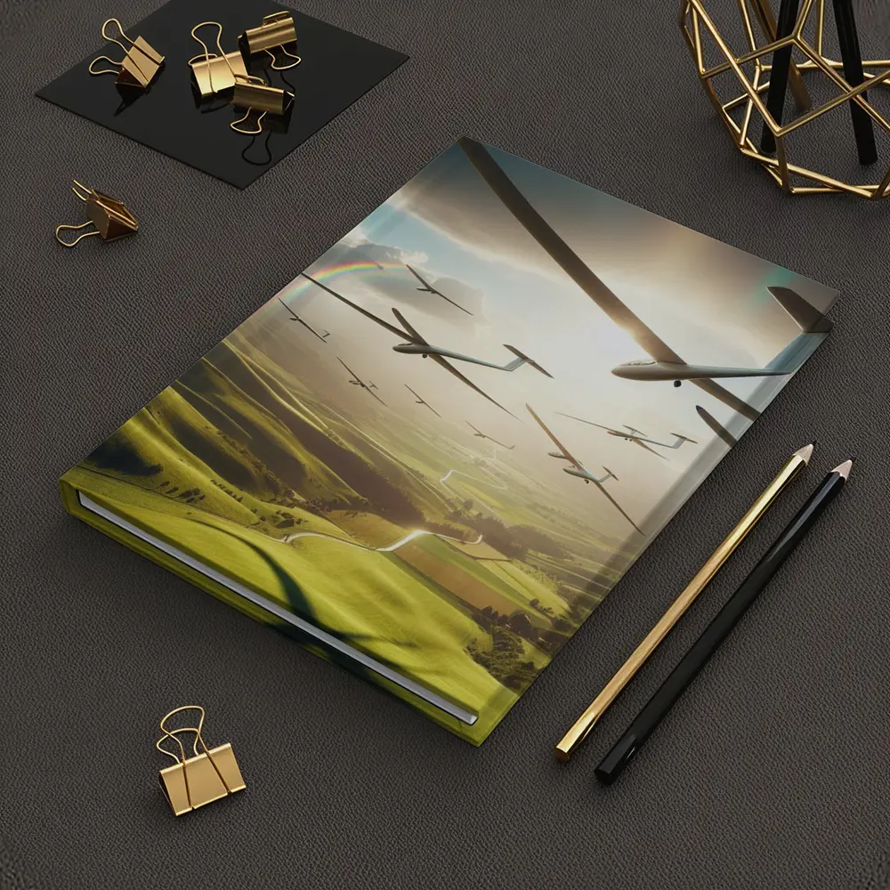 Gliders Soaring Over Green Rolling Hills – Notebooks