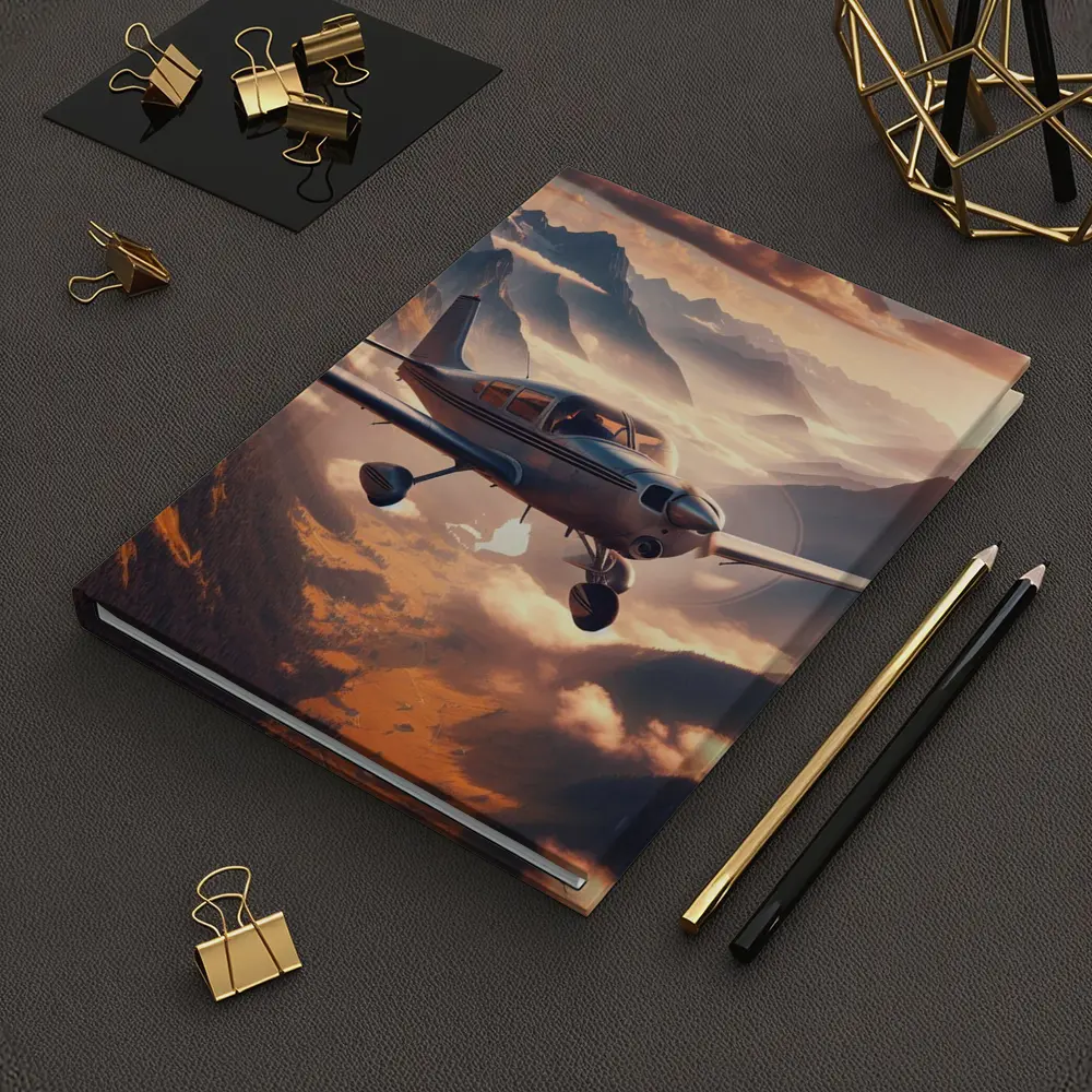 Small Propeller Plane Flying Over Mountains – Notebooks