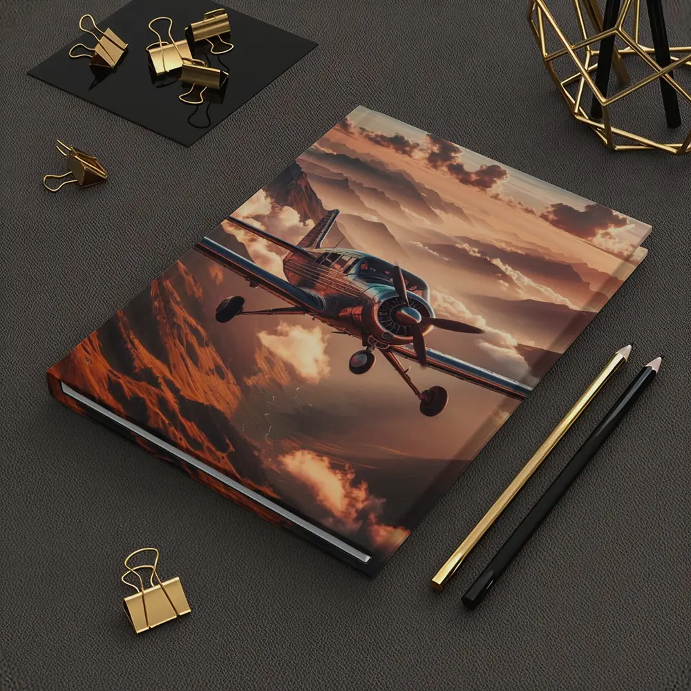 Propeller Plane Flying Over Mountain Sunset – Notebooks