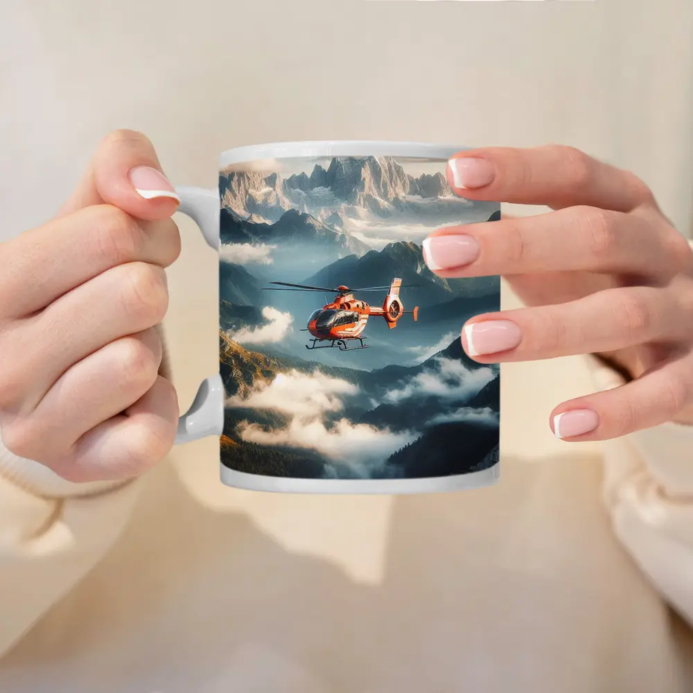 Orange Helicopter Flying Over Misty Mountains – Mugs