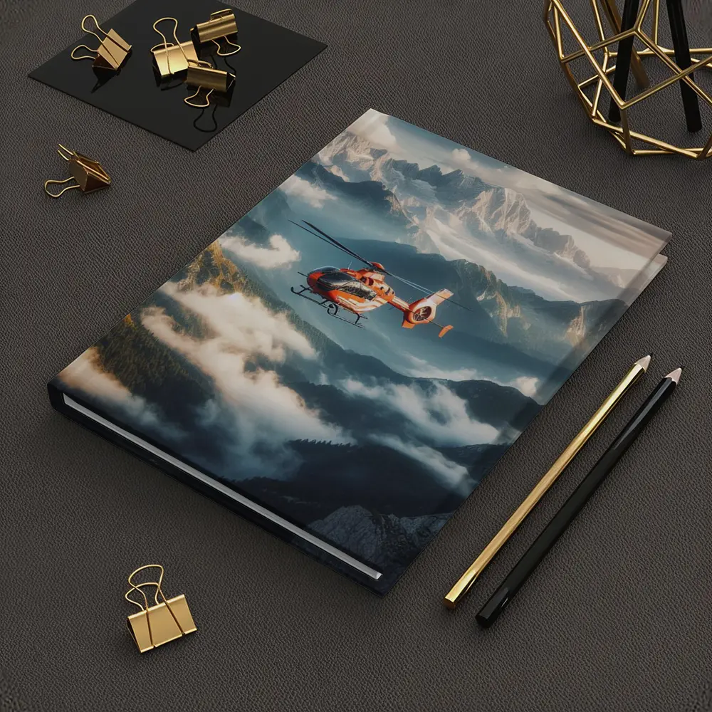 Orange Helicopter Flying Over Misty Mountains – Notebooks