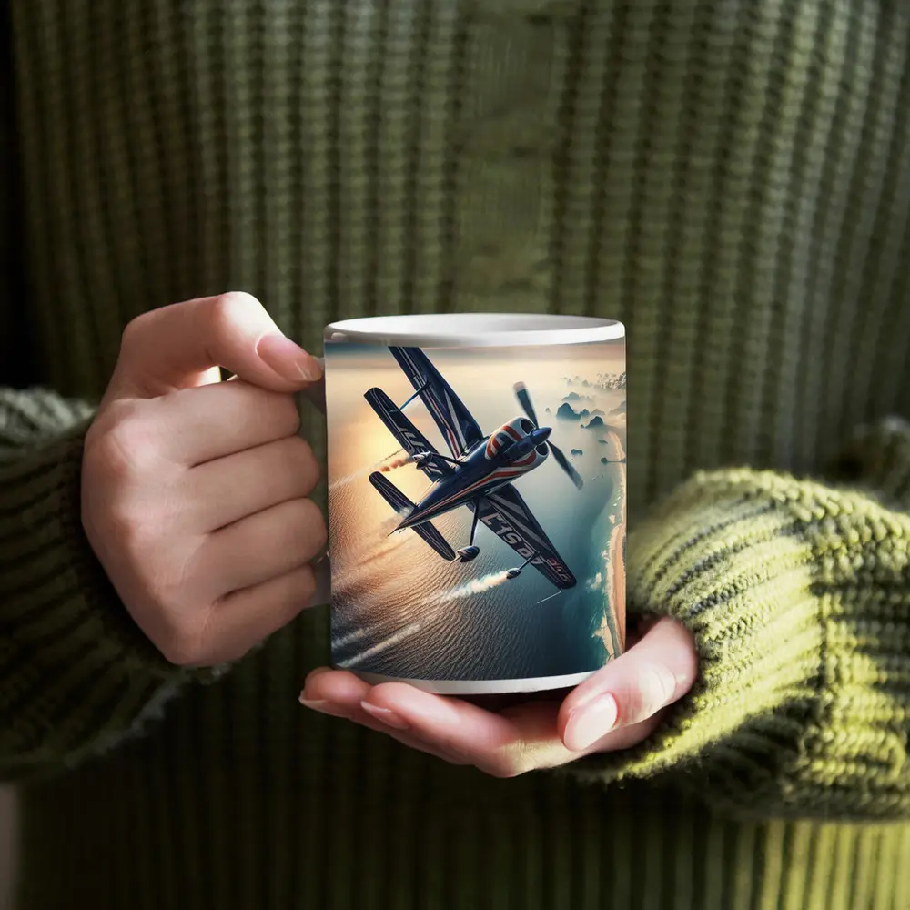Aerobatic Biplane Flying Over Coastal Waters – Mugs